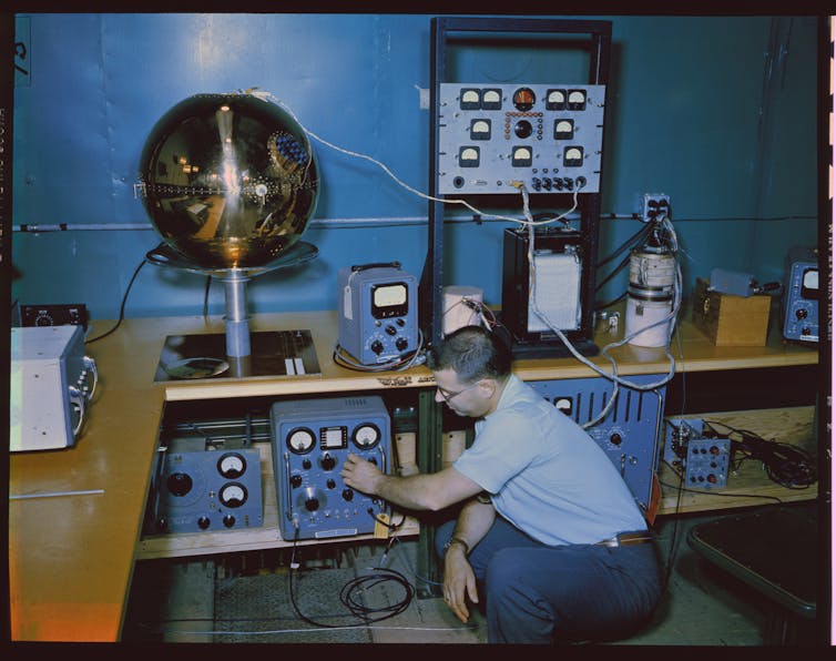 An engineer tunes the equipment ahead of the launch.